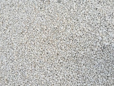 Close-up of white gravel, also mineral aggregrates in construction 